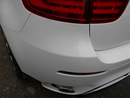 Задний бампер BMW X6 после ремонта и покраски
