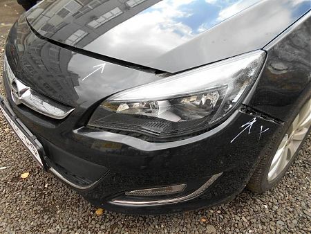 Зазоры  в местах крепления к крылу Opel Astra