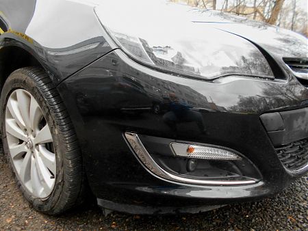 Отремонтированная деталь автомобиля Opel Astra